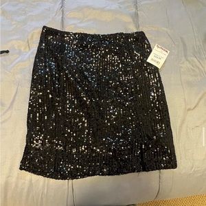 Size 3 Black sequins skirt with tags. never worn